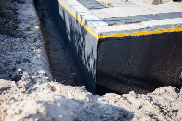 Professional Exterior Waterproofing technician working in Greentown, OH